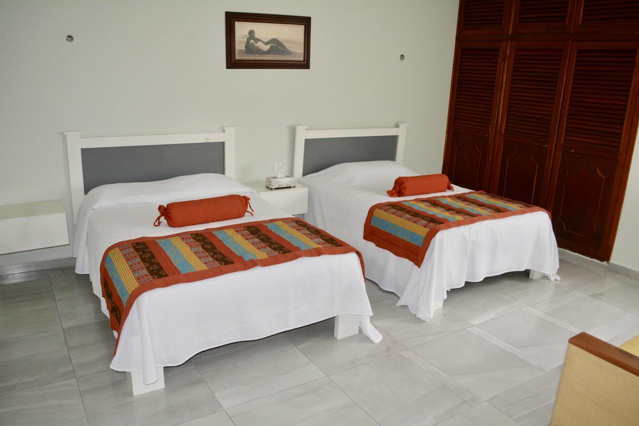 פוארטו מורלוס Suites Sanrey מראה חיצוני תמונה