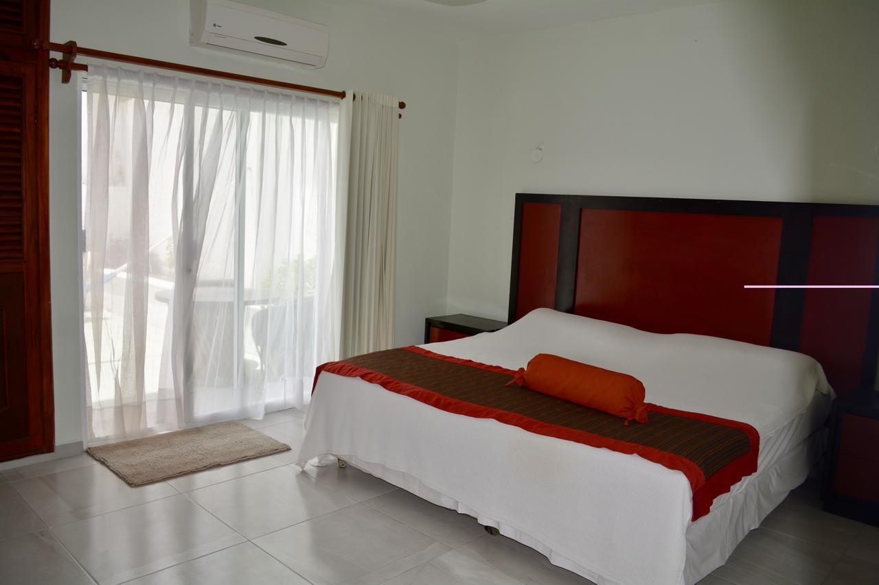פוארטו מורלוס Suites Sanrey מראה חיצוני תמונה